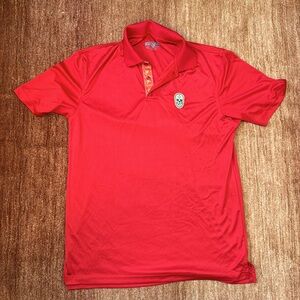 Red sports polo with skull logo